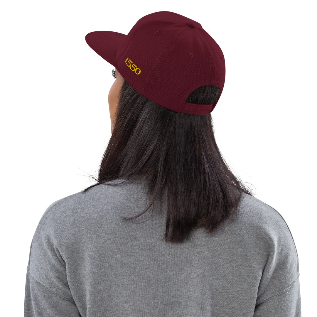1550 VARSITY SNAPBACK HAT