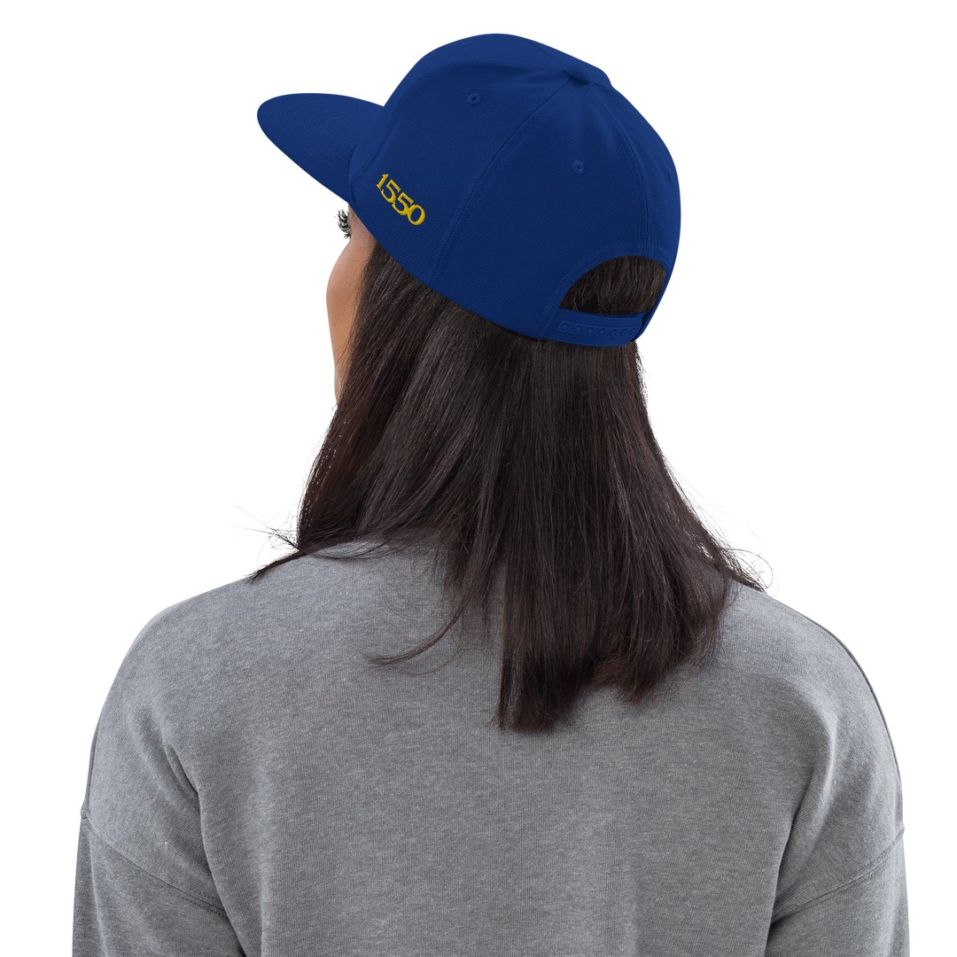 1550 VARSITY SNAPBACK HAT
